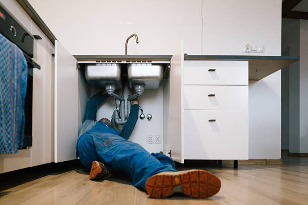 Professional Drain Cleaning technician working in Madera, CA